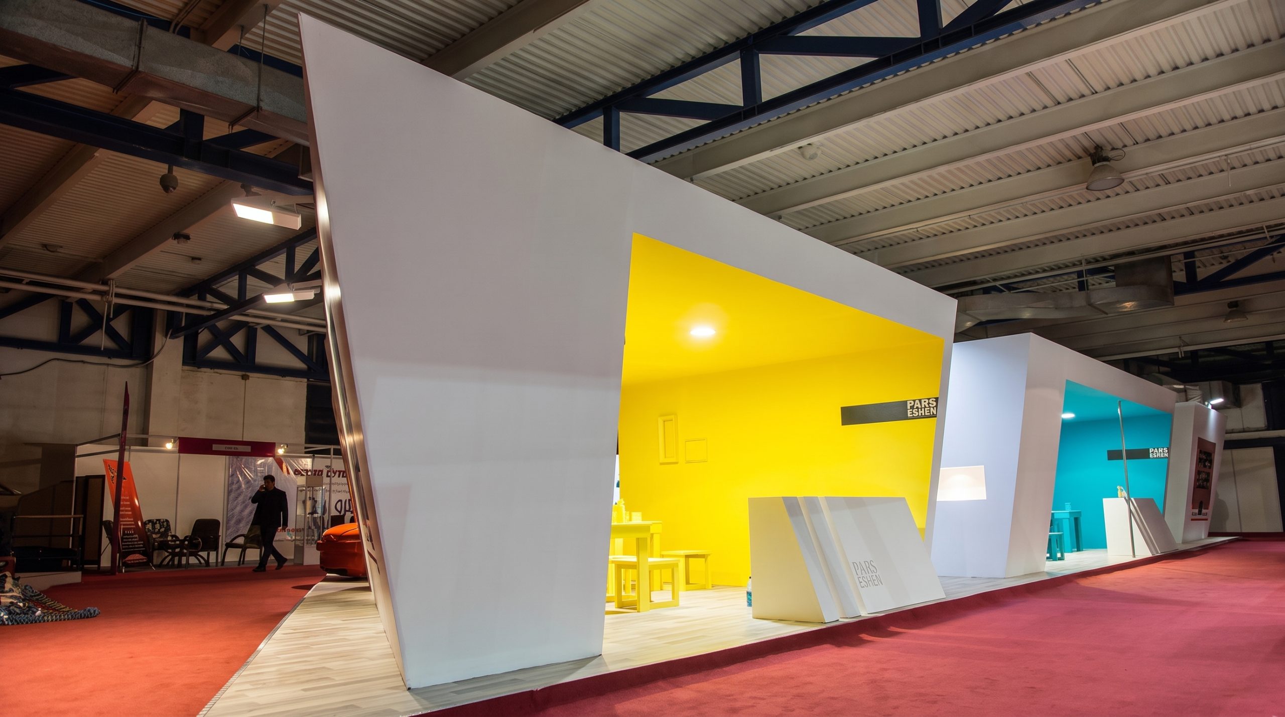 Completed custom wooden exhibition booth for Pars Eshen finished in matte white paint in Hall 35A Tehran
